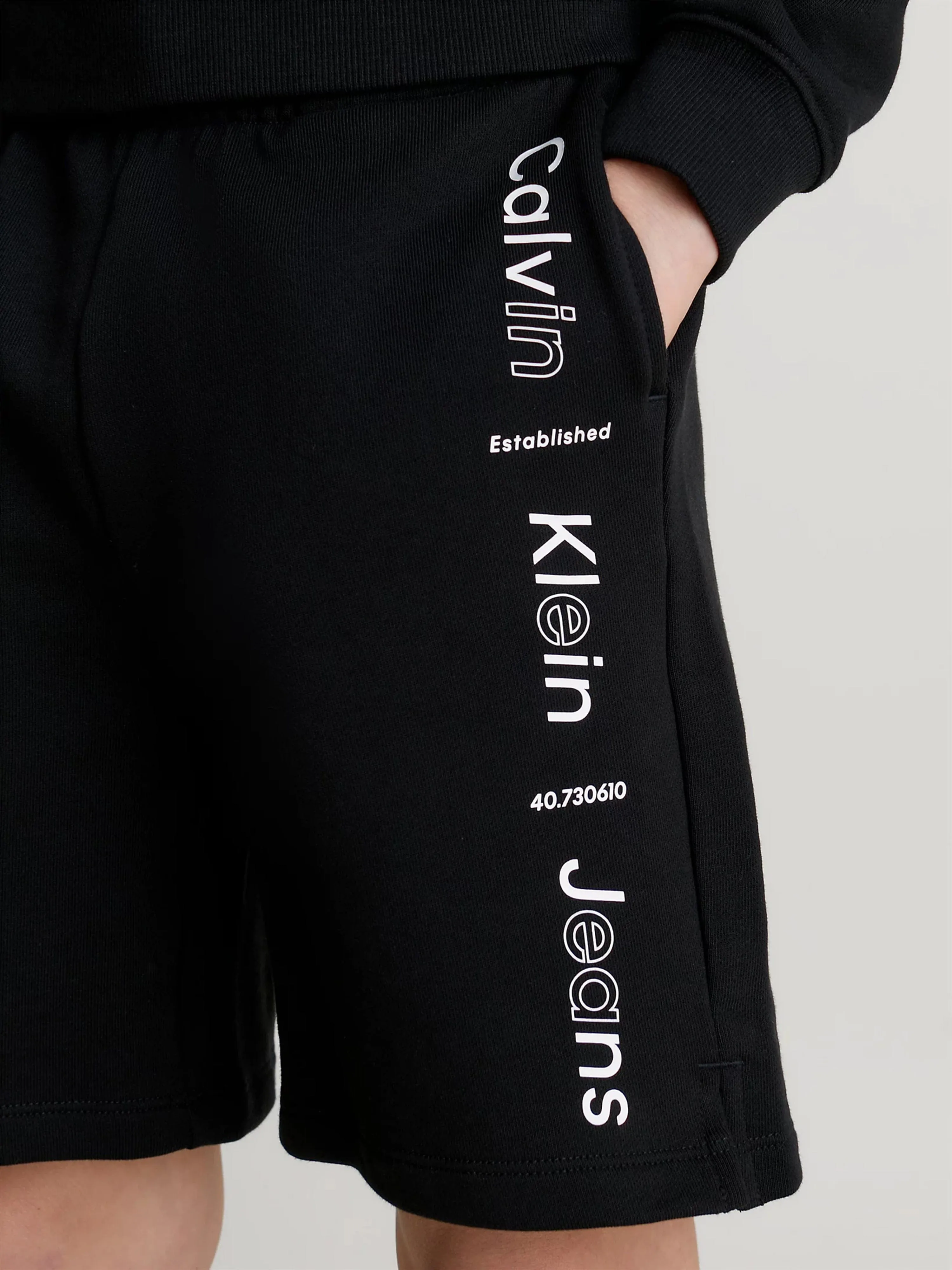 Calvin Klein Boys Maxi Logo Relaxed Shorts in Black